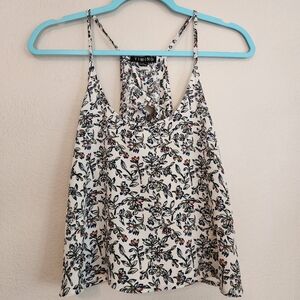 Timing ruffled open-back cami